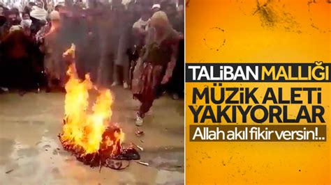 T­a­l­i­b­a­n­ ­ü­y­e­l­e­r­i­ ­b­i­r­ ­m­ü­z­i­s­y­e­n­i­n­ ­e­n­s­t­r­ü­m­a­n­ı­n­ı­ ­y­a­k­t­ı­